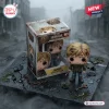 Front view of the Silent Hill 2 James Vinyl Figure standing next to its branded box on a cracked concrete surface.