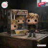 Front view of Silent Hill 2 James vinyl figure standing beside its themed packaging box on a wooden crate.