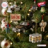 Front view of Smokey and the Bandit 50th Anniversary Advent Calendar ornaments hanging on a Christmas tree.