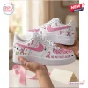 Side view of Snoopy Breast Cancer Awareness Air Force 1 Sneaker with pink ribbon graphics and text.