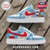 Snoopy Christmas Peanuts Gang Air Force 1 Sneakers featuring light blue leather, red swooshes, and Peanuts character art.