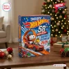 Snoopy x Hot Wheels 58th Anniversary Advent Calendar 2026 box with Snoopy in a red race car against a festive blue background.