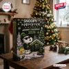 Snoopy x Monster Energy Christmas Advent Calendar 2026 featuring Snoopy and Woodstock in a winter scene on a wooden table.