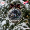 Front view of a clear Star Wars 50th Anniversary Christmas ornament featuring a miniature space battle scene.