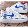 Side view of Stitch Down Right Perfect Blue Awareness Air Force 1 Sneakers on wooden background.
