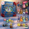 Front view of a Super Mario 2026 Advent Calendar box surrounded by various hanging character and item ornaments.