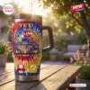 Front view of Super Mario 41st Anniversary Stanley Tumbler on wooden table.