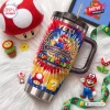 Front view of Super Mario 41st Anniversary Stanley Tumbler with tie dye design and character figures.
