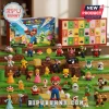 Super Mario Rabbids Kingdom Battle Advent Calendar with assorted plastic character figurines on a grassy terrain display.