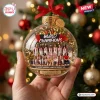 Hand holding a clear glass ornament featuring a Team USA Basketball 2026 World Champions photo and golden confetti.
