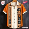 Front view of an orange and white Hawaiian shirt featuring hound dog and text graphics.