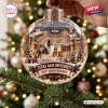 Close-up of a glass Christmas ornament featuring a stadium, dog, and Texas A&M University 150th Anniversary text.