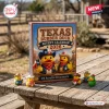 Texas Cowboy Rubber Duck Advent Calendar 2026 box with cowboy-themed duck ornaments on a rustic outdoor wooden table.