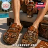 Texas Longhorns Burnt Orange Suede Clogs featuring embossed team logos, football imagery, and Austin, Texas text accents.