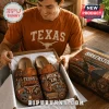 Texas Longhorns Burnt Orange Suede Clogs featuring University of Texas graphics, metal buckles, and a cork footbed.