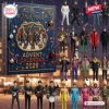 The Beatles Fab Four Advent Calendar 2026 featuring blue packaging with gold accents and multiple miniature band figures.