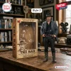 The Good The Bad and The Ugly Blondie 60th Anniversary Hot Toys figure featuring Angel Eyes in a detailed box on a desk.