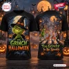 Front and back view of a black Grinch Witch Hat Halloween shirt featuring a holiday town scene and character graphics.