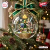 Front view of a clear glass ball ornament featuring a warrior figure, castle, and 40th anniversary plaque on a tree.