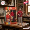 The Monkees 60th Anniversary Collectible Figure of Peter Tork in a red jacket standing next to a branded display box.