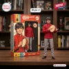 The Monkees 60th Anniversary Collectible Figure of Davy Jones wearing a red tunic and holding a small tambourine.