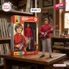 The Monkees 60th Anniversary Collectible Figure of Peter Tork in a red jacket standing with a guitar next to packaging.