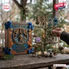 The Odyssey Greek Mythology Advent Calendar 2026 with hanging bronze and colored ornaments on a dark metal display stand.