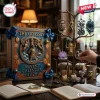 The Odyssey Greek Mythology Advent Calendar 2026 with an ornate blue book box and a metal display tree holding ornaments.