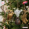 The Odyssey Greek Mythology Advent Calendar 2026 ornaments featuring gold owl, wind vortex, bow, and winged sandals on a tree.