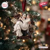 The Phantom of the Opera 40th Anniversary Christmas Ornament featuring the Phantom holding Christine against sheet music.