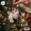 The Phantom of the Opera 40th Anniversary Christmas Ornament featuring the Phantom and Christine on a tree branch.