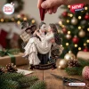 The Phantom of the Opera 40th Anniversary Christmas Ornament features the Phantom holding Christine against sheet music.