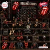 The Rolling Stones Advent Calendar 2026 featuring 24 numbered compartments and miniature rock memorabilia figures on shelves.