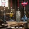 Top Gun 40th Anniversary 2026 Advent Calendar hanging ornaments including fighter jets, a pilot figurine, and a metal tag.