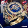 USA Basketball FIBA 2026 World Champions ring featuring a blue gemstone center, gold band, and encrusted accent stones.