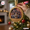 Hand holding a gold oval USA FIBA Women’s World Cup 2026 Champions ornament featuring a team photo against a US flag.