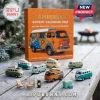 Vintage Campervan 2026 Advent Calendar box behind miniature die-cast campervans and camping accessories on a wooden table.