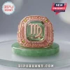 Virgo The Maiden Rose Gold Zodiac Ring featuring a large green emerald-cut center stone and intricate metal engravings.