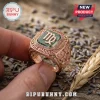 Virgo The Maiden Rose Gold Zodiac Ring featuring a central green stone, small accent gems, and engraved star details.