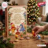 Winnie the Pooh 100th Anniversary Christmas Advent Calendar featuring holiday-themed character figurines on a wooden table.