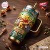 Angled view of a Winnie the Pooh Hundred Acre Wood 40oz Stanley Tumbler featuring raised character artwork.