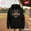 Front view of WPBL Los Angeles Queens 2026 Champions Black Hoodie with gold pinstripes and chest graphic.