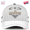 Front view of a white baseball cap with pinstripes and Los Angeles Queens 2026 champions graphics.