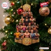 Front view of a WWE Legends Christmas Ornament 2026 hanging on a tree with wrestling figures and a gold championship belt.