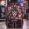 Front view of a black backpack featuring wrestling legends graphic print and custom text placeholder.