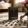 WWII Aircraft Advent Calendar 2026 featuring a black box with numbered slots and miniature fighter planes on a carpet floor.