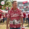 Man wearing a red Hawaiian shirt featuring Alabama Crimson Tide imagery, stadium graphics, and vintage football player art.