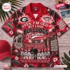 Front view of a red Hawaiian shirt with Georgia Bulldogs football imagery and text about football greatness.