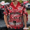 Front view of a red Hawaiian shirt featuring Georgia Bulldogs text, stadium imagery, and player jersey numbers.