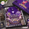 Top-down view of Minnesota Vikings Hawaiian shirt in a gift box with matching tumbler and figurine.